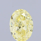 0.71 Carat Natural Fancy Yellow color Diamond ,Oval Modified Brilliant Cut Diamond , Vvs1 Clarity