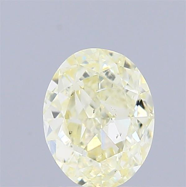 0.72 Carat Natural Fancy Light Yellow color Diamond ,Oval Modified Brilliant Cut Diamond , Vs2 Clarity