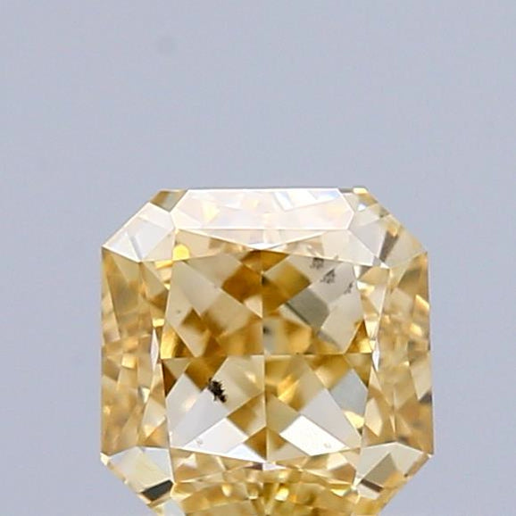 0.77 Carat Natural Fancy Deep Yellow color Diamond ,Square Radiant Modified Brilliant Cut Diamond , Vs1 Clarity