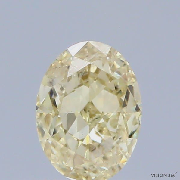 0.55 Carat Natural Fancy Yellow color Diamond ,Oval Modified Brilliant Cut Diamond , Si1 Clarity