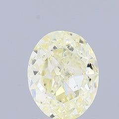 0.72 Carat Natural Fancy Light Yellow color Diamond ,Oval Modified Brilliant Cut Diamond , Vs2 Clarity