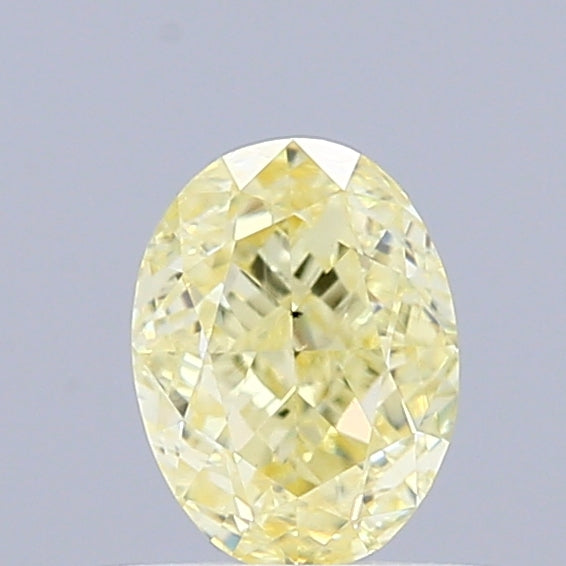0.62 Carat Natural Fancy Yellow color Diamond ,Oval Modified Brilliant Cut Diamond , Vs1 Clarity